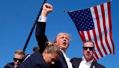 Trump rally shooting: Horrifying new clip shows cops with guns surrounding building, then gunfire erupting: Watch