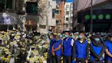 Chinese gather and lay flowers despite heavy security as former Premier Li Keqiang is laid to rest