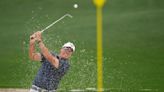 Mickelson makes Masters move before weather halts play