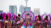 Costumed dancers and mas bands add sizzle to a sweltering day at the Toronto Caribbean Carnival Grand Parade