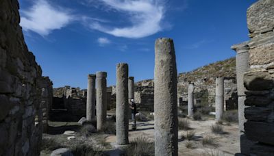 Ancient Greek sanctuary slowly sinks into the Aegean Sea