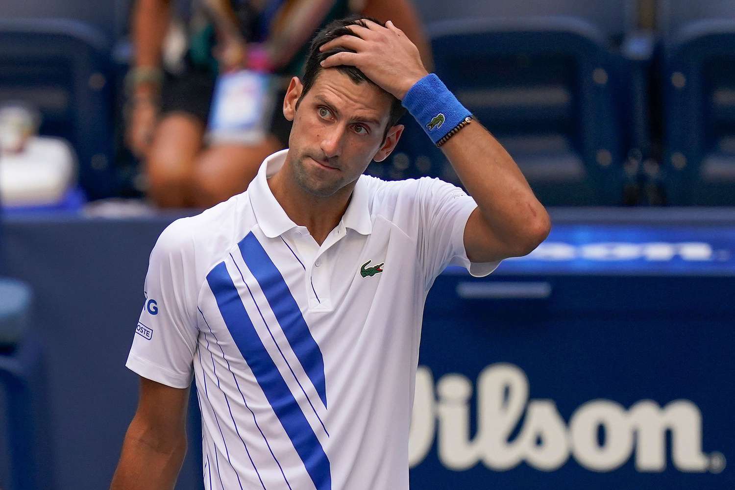 Novak Djokovic Hit on Head by Water Bottle While Signing Autographs for Fans at Italian Open