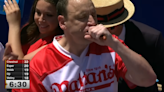 Star athlete Joey Chestnut overcomes injury, COVID, and protester to defend hot dog eating record