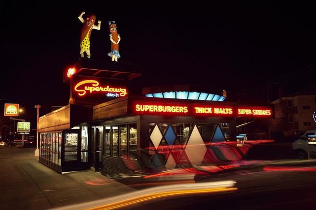 Famous hot dog mascots at Superdawg on Chicago's Northwest Side temporarily removed for restoration