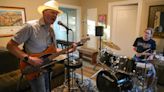 UT-Austin dean learns to play bass to help with his Parkinson's; See photos