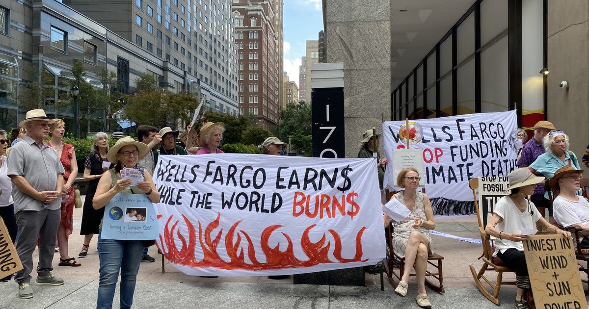 Seniors protest Wells Fargo's investment in fossil fuels outside Center City branch