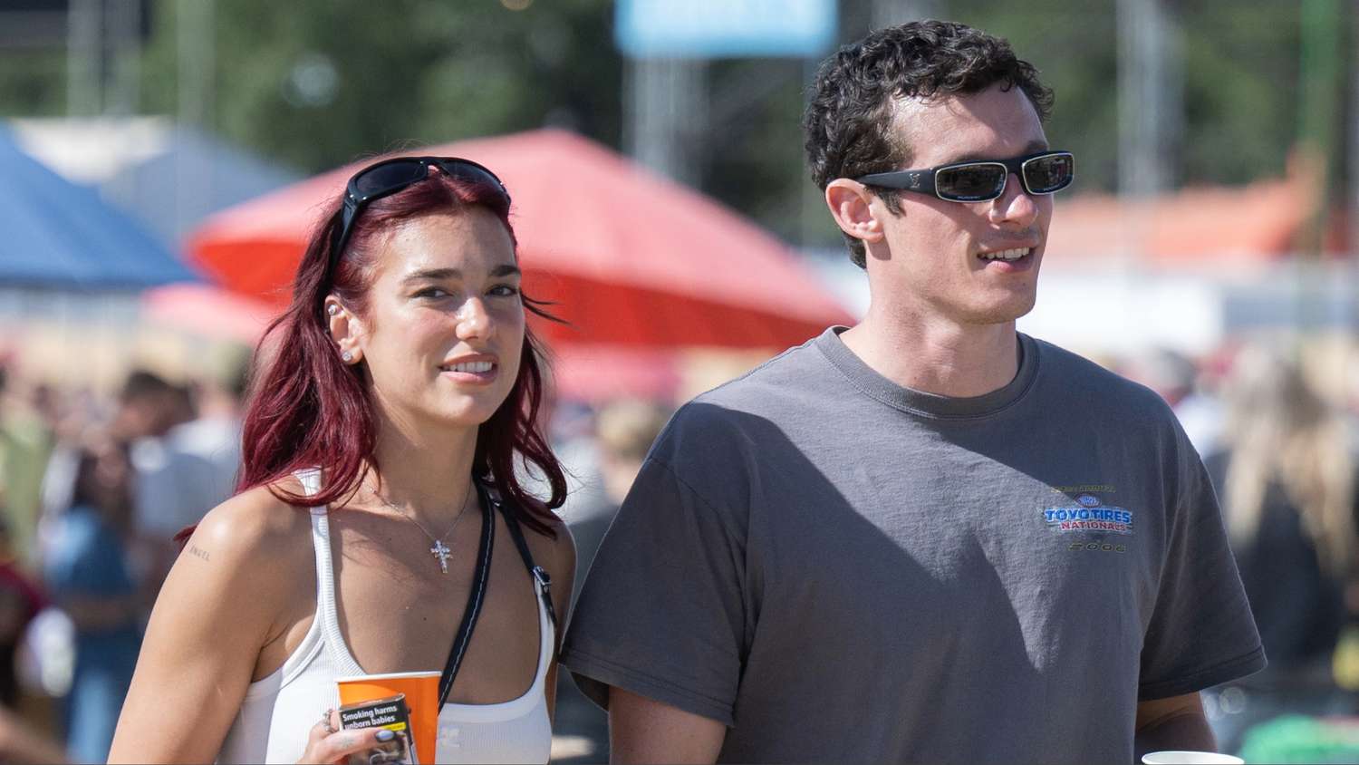 Dua Lipa Held Hands With Callum Turner While Wearing a High-Slit Leather Skirt at Glastonbury