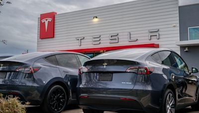 Tesla recalls 1.8 million cars over hood issue