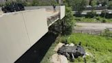 Porsche Crashes Off Rooftop Parking Garage, Wads of Cash Found Atop Wreck