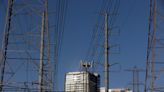 The nation’s power grid is overwhelmed. New rules aim to boost construction.