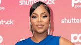 Ashanti, 43, debuts baby bump in blue dress after announcing engagement to Nelly