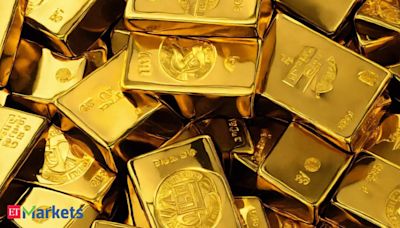 Gold little changed as traders brace for US data