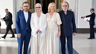 ABBA reunite to collect prestigious knighthood from Swedish King and Queen in incredible pics