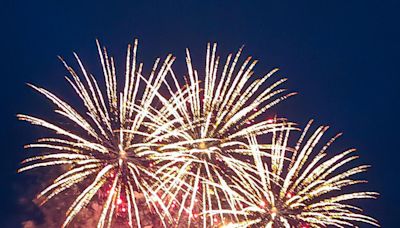 Crowds in awe as fireworks bring bursts of colour into the night sky