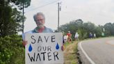 Residents, environmental groups protest development near Hamilton Pool outside UT event