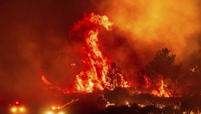 California's largest wildfire explodes in size as fires rage across US West