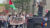 Pro-Palestinian demonstrators march through downtown Richmond to Senators’ offices