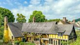 Inside Grade II listed south Shropshire school house with a river in its garden which is up for sale