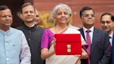 Budget 2024: FM Nirmala Sitharaman, Draped in White & Magenta Silk Saree, Poses With Tablet in Red Sleeve - News18