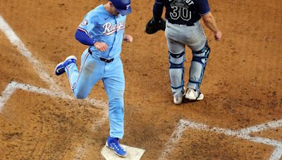 Langford and Heim have 4 hits each as Rangers rout Rays 13-2 for 3-game sweep