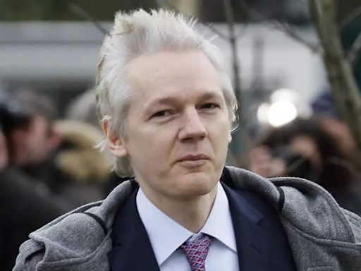 Why is Julian Assange flying to the remote Pacific island of Saipan? - Times of India
