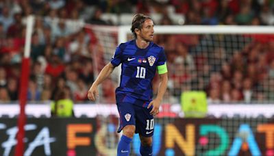 Luka Modrić scores the winner against Poland