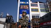 Cinema opens in Kashmir city after 14 years but few turn up