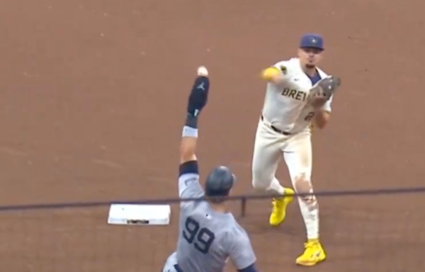 Aaron Judge broke up a double play by blocking the throw with his hand and somehow wasn't called for interference