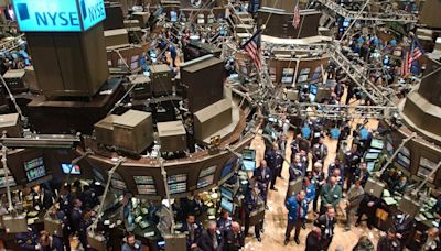 Wall Street cierra levemente a la baja a la espera de resultados de Alphabet y Tesla