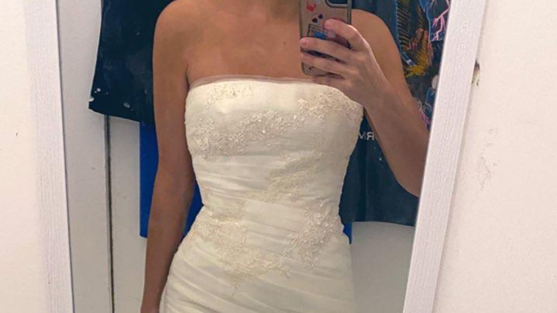 I thrifted a wedding dress for $20 - the label told me how much I scored