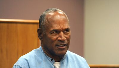 OJ Simpson did not die surrounded by loved ones, says lawyer