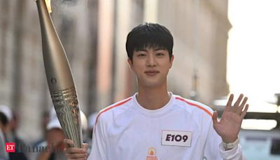 BTS’ Jin makes ARMY proud as he becomes the 1st Korean artist to lift the Olympic Torch! - The Economic Times