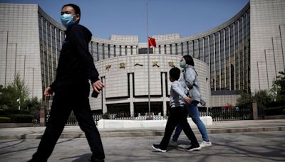 China cuts short and long-term rates