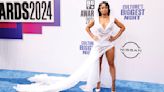 Blac Chyna flashes the flesh in a glamorous low-cut white gown