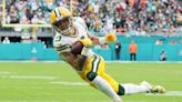 Packers receiver Christian Watson leaves game vs. Dolphins with a hip injury, ruled out