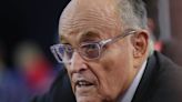 Trump ally Rudy Giuliani takes a fall inside Fiserv Forum at the RNC