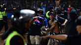 129 people are dead after police fired tear gas to break up fights following an Indonesian soccer match