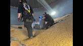 Man sinks into grain bin as rescuers race to help him out of corn, Tennessee crews say