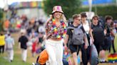 Initial bad weather does nothing to dampen spirits of Glastonbury festival-goers