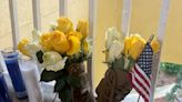 Questions and grief linger at the apartment door where a deputy killed a US airman