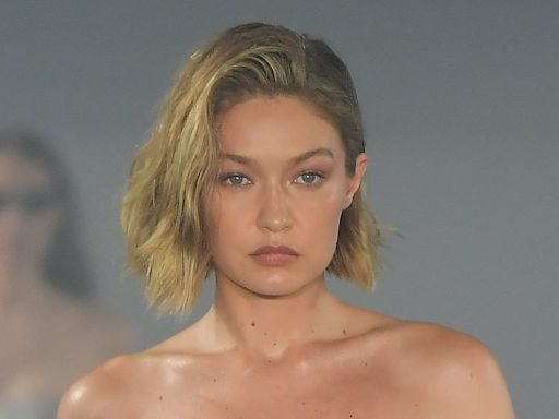 Gigi Hadid sports mini dress made from DHL parcel tape