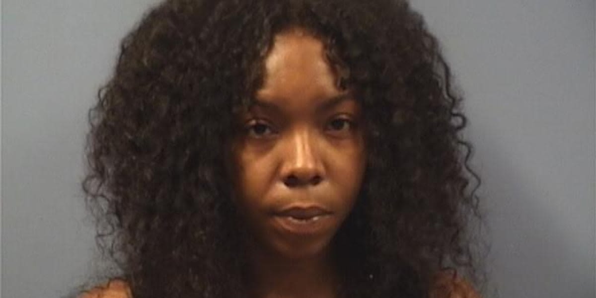 Woman accused of attacking victim with hatchet at gas station