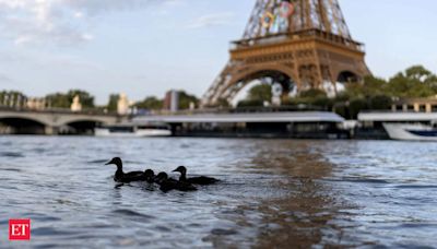 Olympic triathletes will swim in Paris' Seine River after days of concerns about water quality - The Economic Times