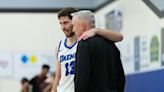 MacDonald father and son embracing march past milestones together at Daemen