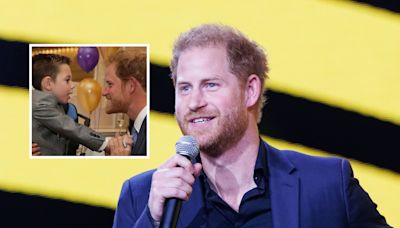 Prince Harry's reaction to hug from child goes viral