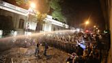 Police use tear gas, water cannons and stun grenades on 'foreign agent' bill protesters in Georgia's capital