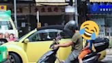 小童戴水桶頭盔坐電單車尾惹網民爆笑 但疑觸犯交通管制法例