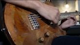 Watch a YouTube luthier take 10,000 fallen leaves and turn them into a beautiful electric guitar