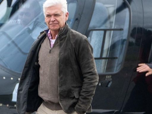 Phillip Schofield arrives at Silverstone in helicopter with entire family