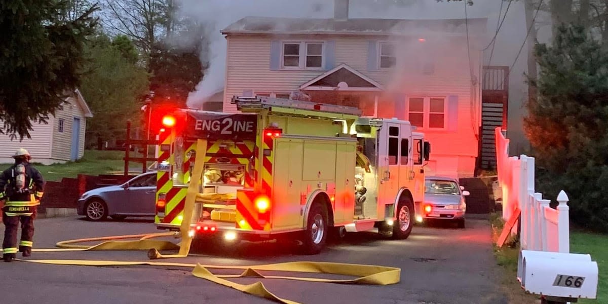 House fire closes road in Farmington